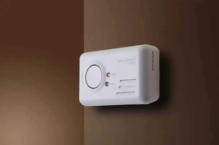 how far should carbon monoxide detector be from furnace